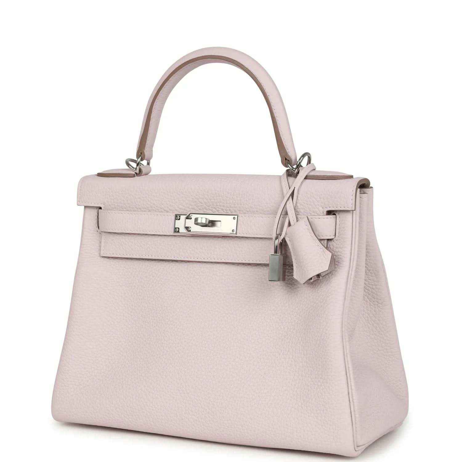 Light mauve leather top-handle handbag with front flap and dangling strap pull tab