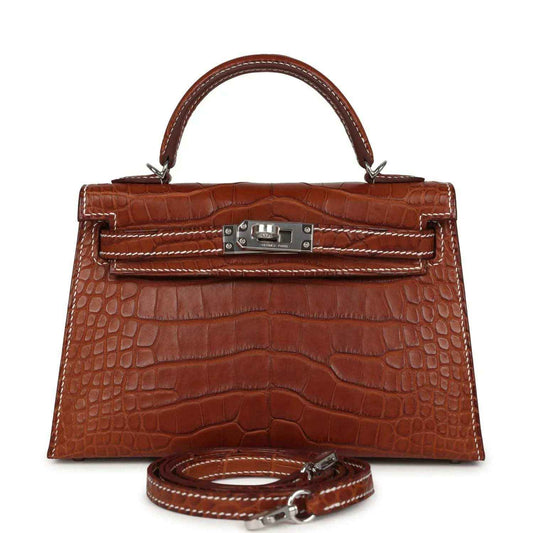 Hermes Kelly Sellier 20 bag in fauve croc leather with top handle and lock