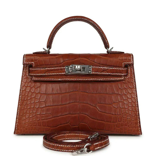 Hermes Kelly Sellier 20 bag in fauve croc leather with top handle and lock