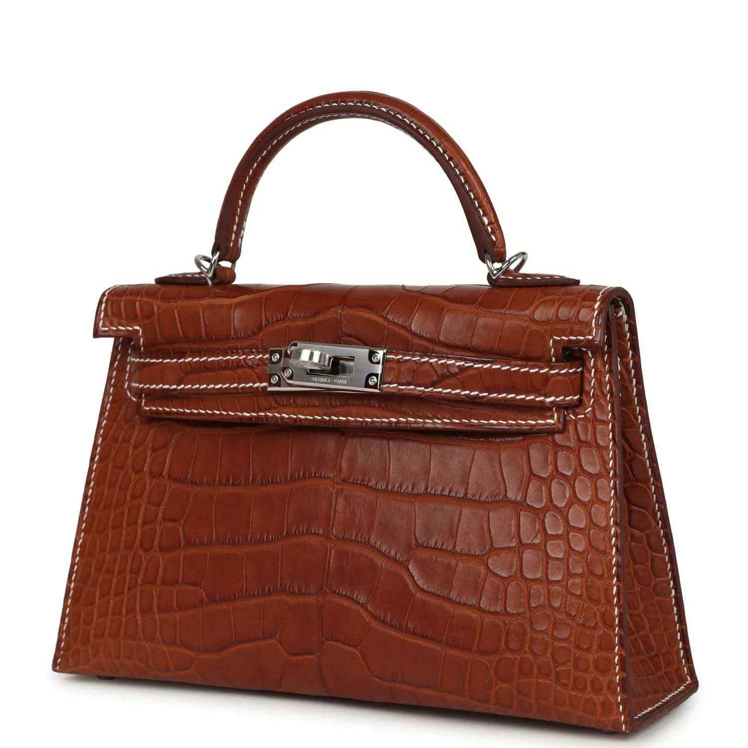 Kelly Sellier bag with fauve croc texture, top handle, front lock plate, stitching