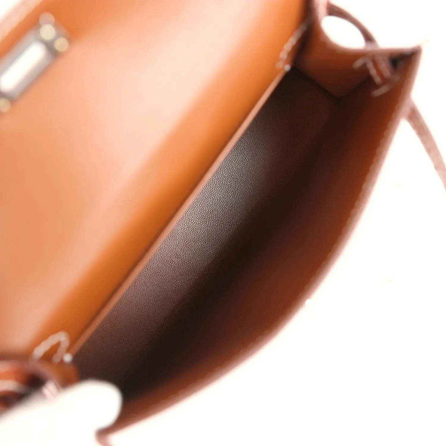 Croc leather bag interior with dark lining and top edge stitched detail