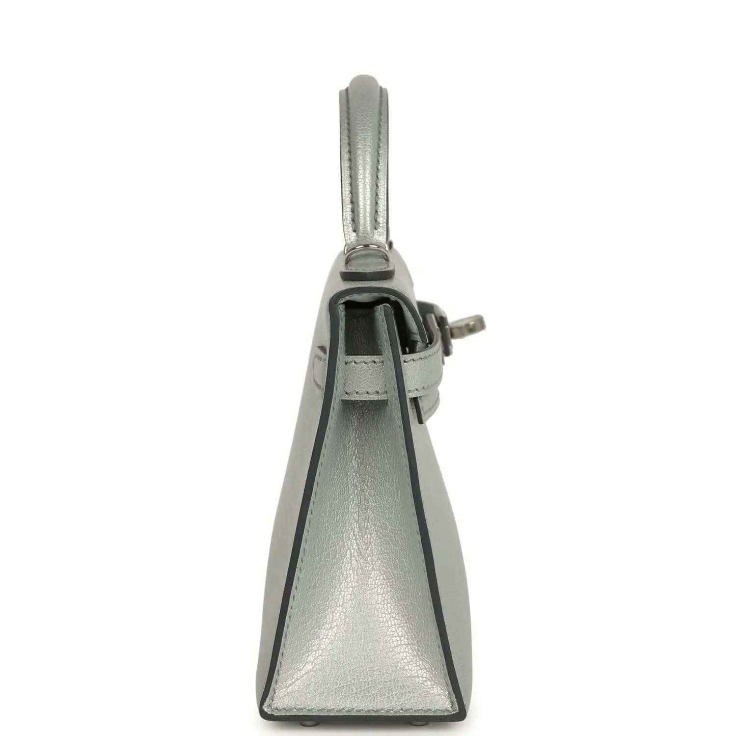 Light gray leather mini handbag, side view with top handle and closure