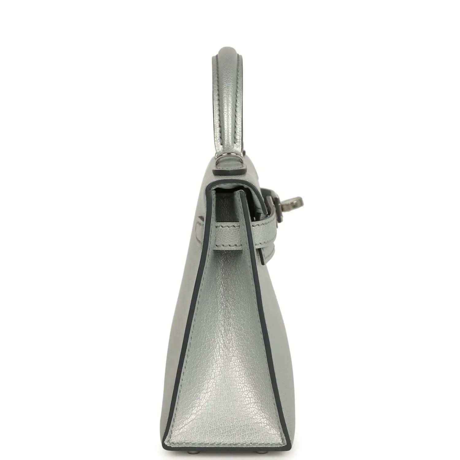 Light gray leather mini handbag, side view with top handle and closure