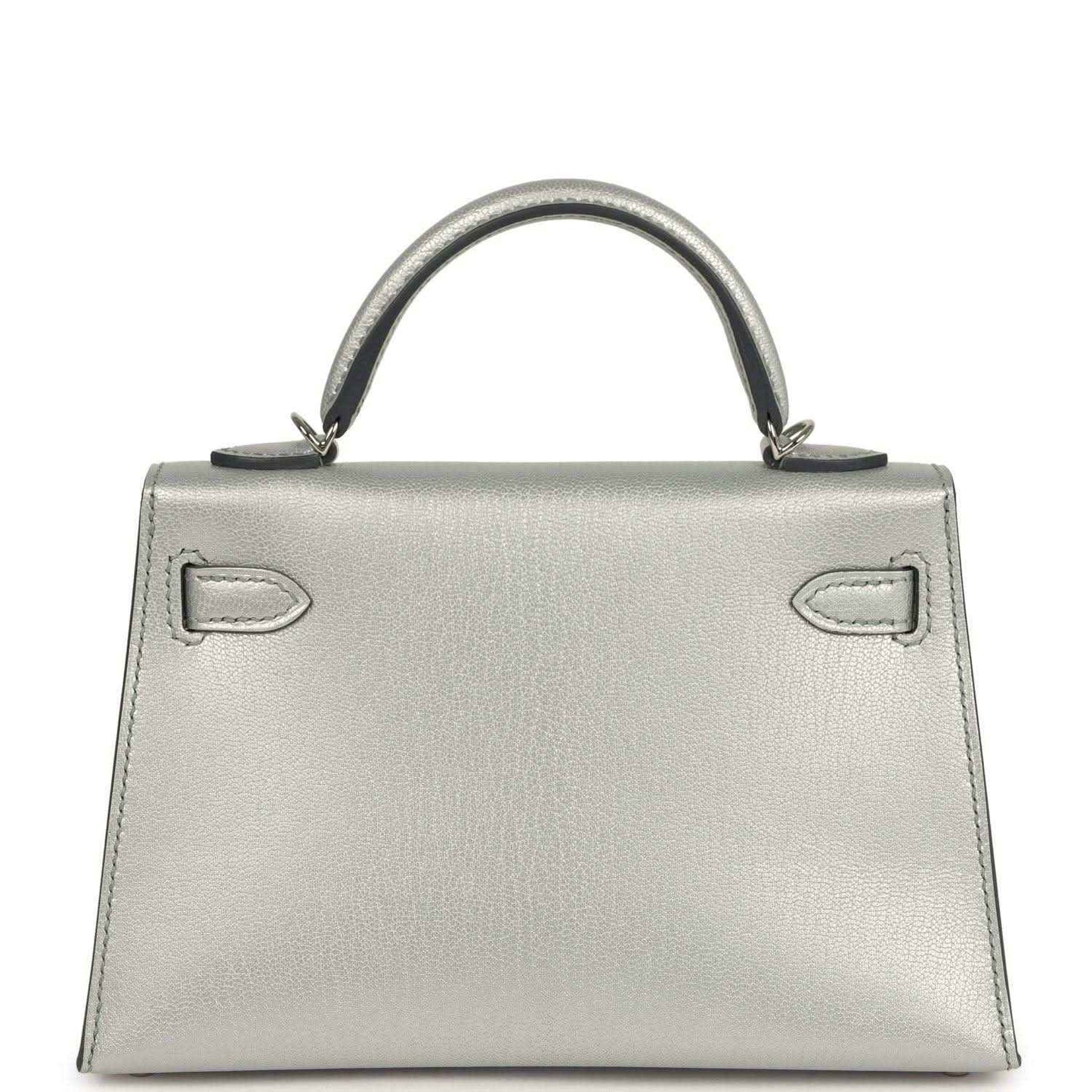 Light gray leather mini handbag with top handle and decorative front strap