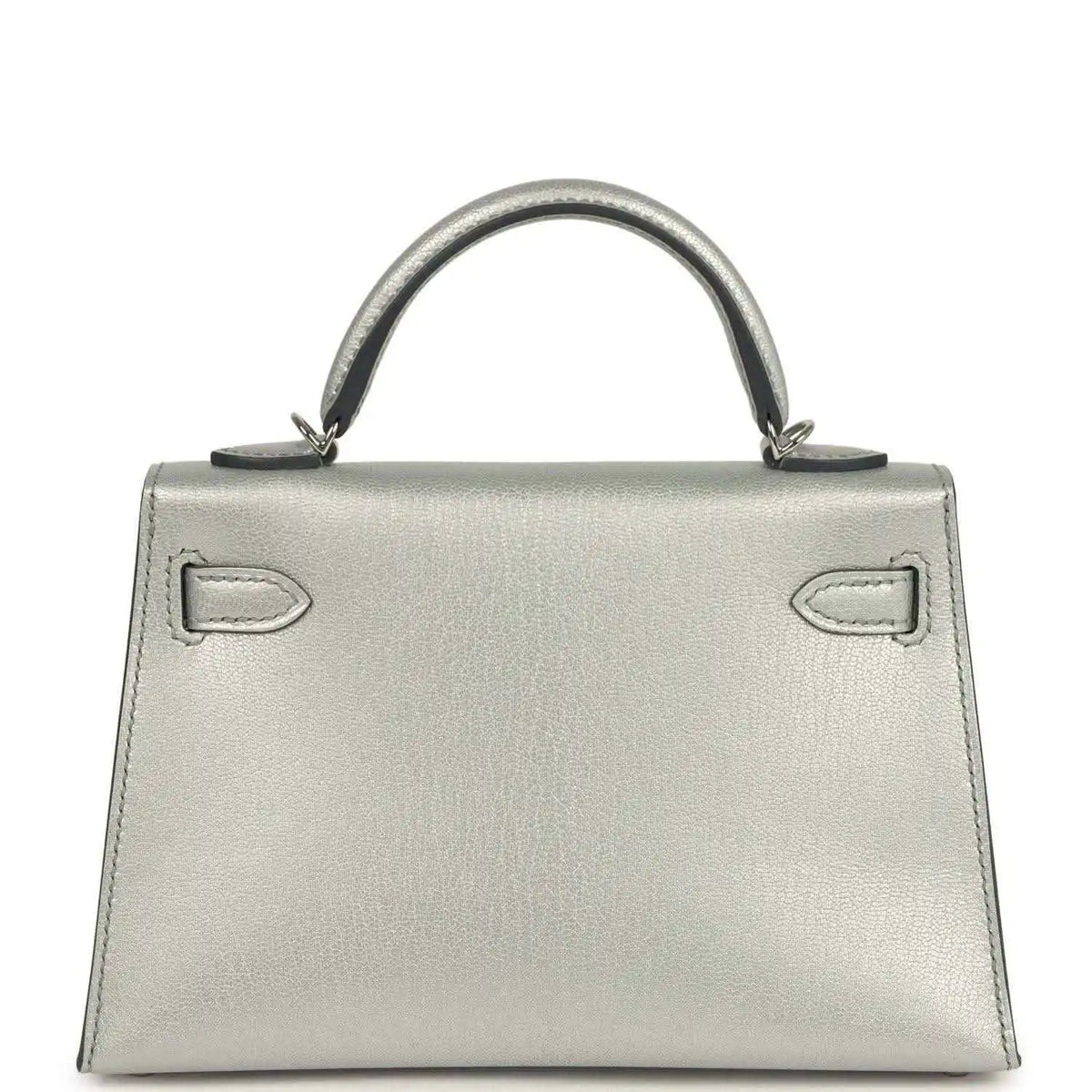Light gray leather mini handbag with top handle and decorative front strap