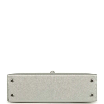Light gray leather mini handbag base with feet and side seam stitching