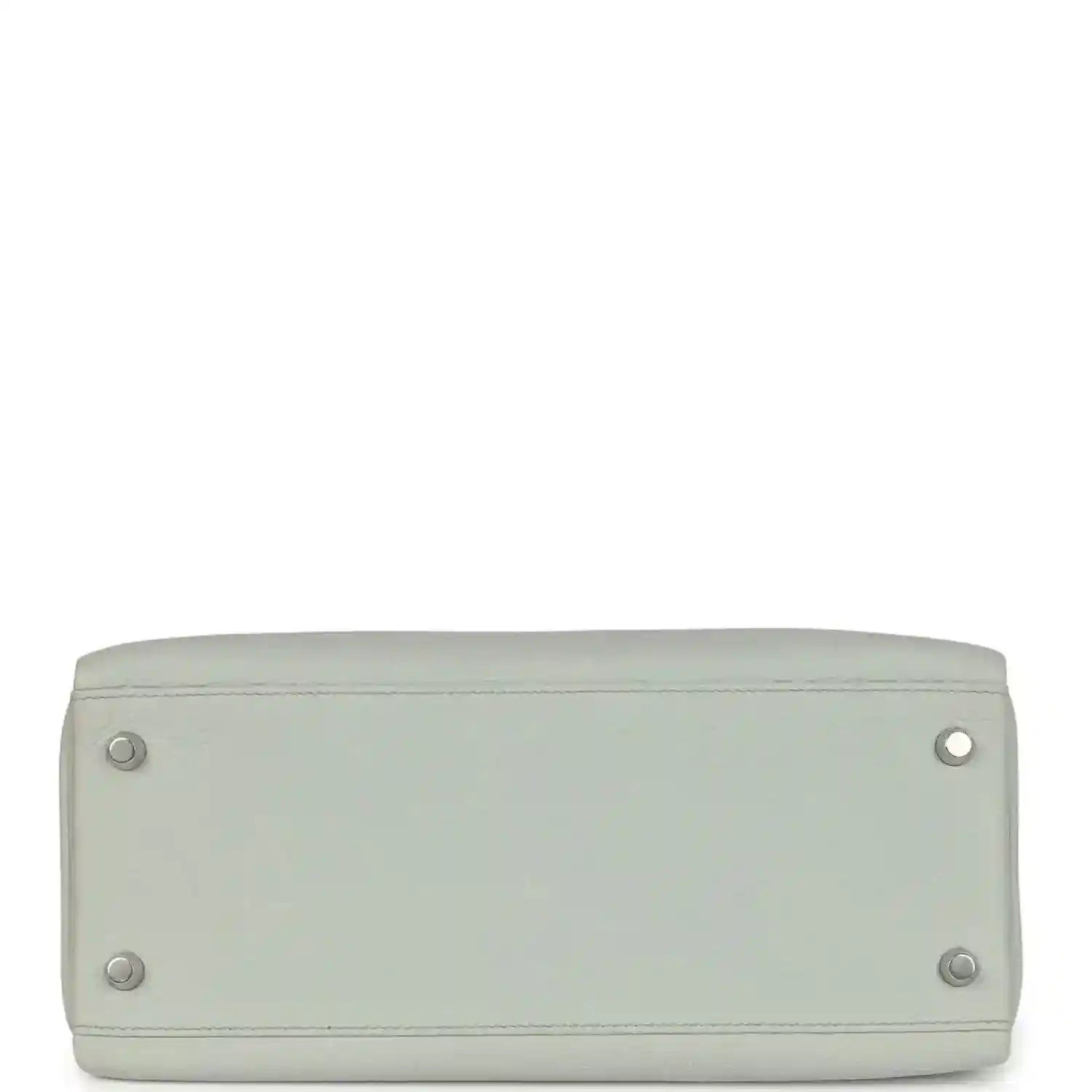 Light blue leather Kelly-style bag base with four metal feet and rounded corners.
