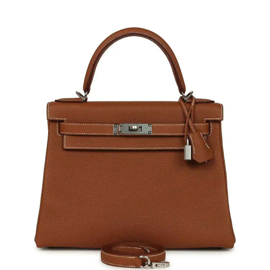 Hermes Kelly Retourne brown leather handbag with top handle and front flap lock
