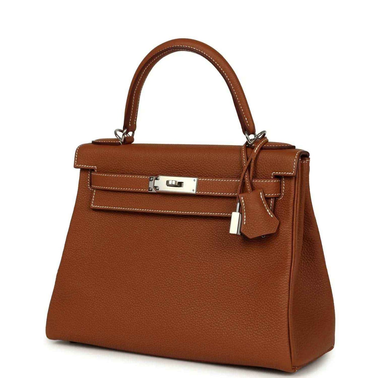 Hermes Kelly Retourne brown leather handbag with front flap, turnlock, and dangling tag