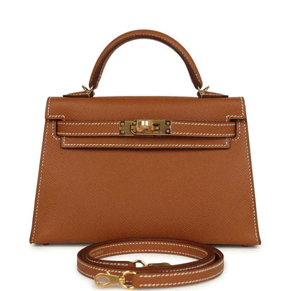Mini leather handbag with top handle, tan Epsom texture and gold front clasp