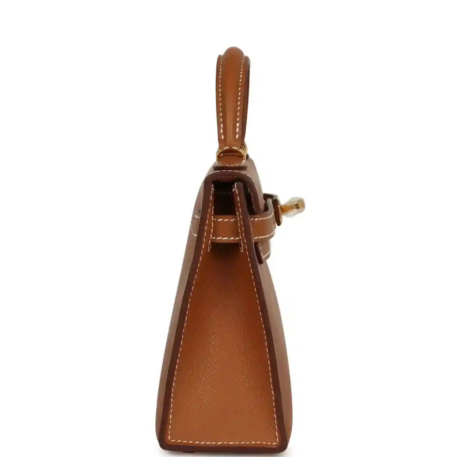 Tan leather mini handbag with top handle and side clasp hardware