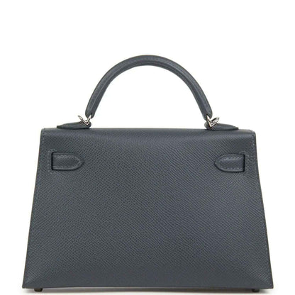Hermes Kelly Sellier 20 bag front view, dark gray-blue grained leather, gold-tone hardware