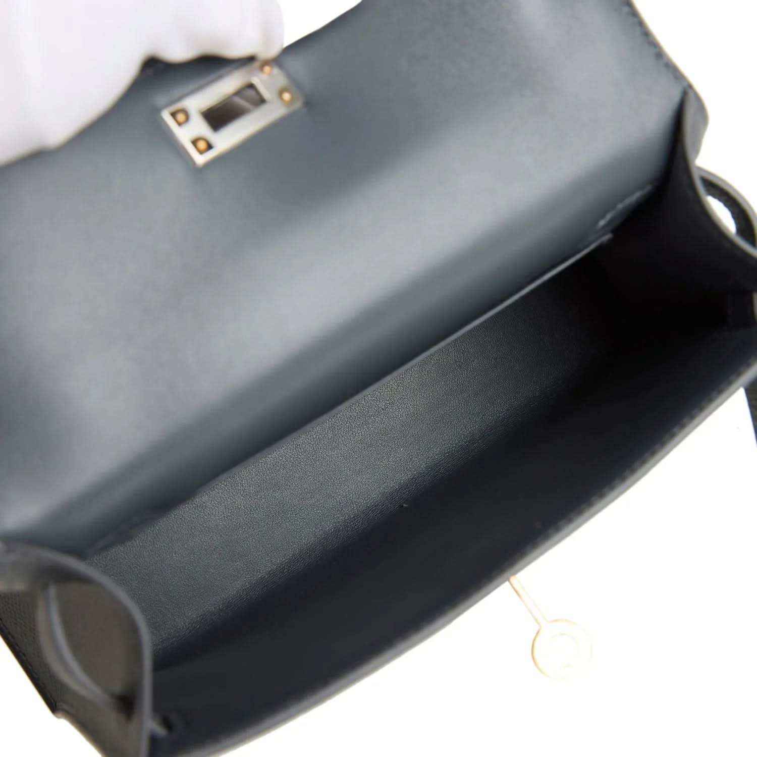Hermes Kelly Sellier 20 bag interior view with dark gray-blue lining and clasp edge