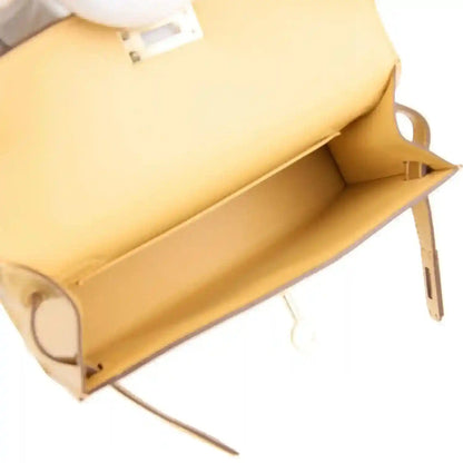 Kelly Sellier 20 handbag open interior with tan lining and side wall pocket