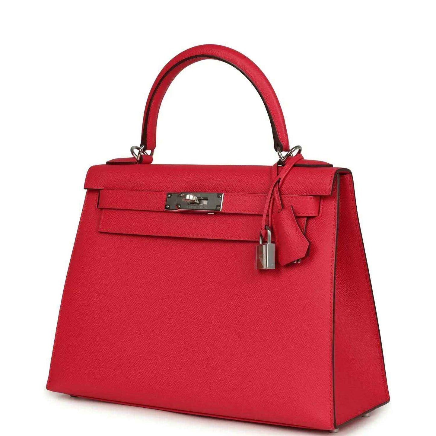 Red leather handbag with top handle, front flap, and hanging padlock charm.