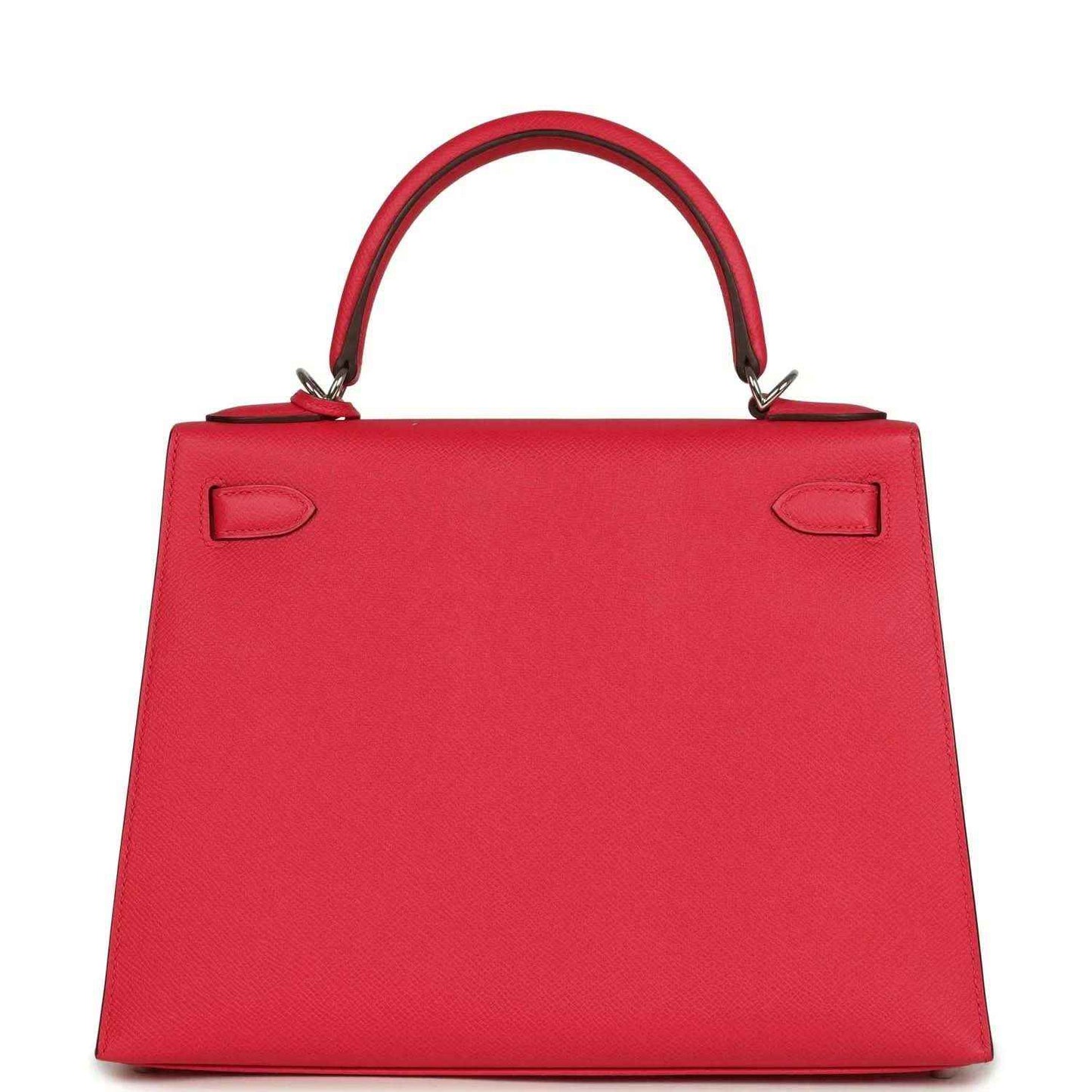 Red leather handbag with top handle, front flap, and two recessed corner details.