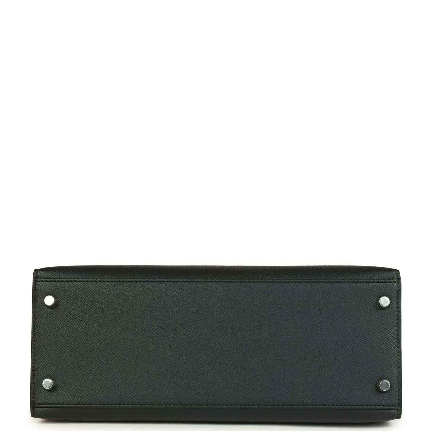 Rectangular leather handbag back panel with four corner studs and clean border trim