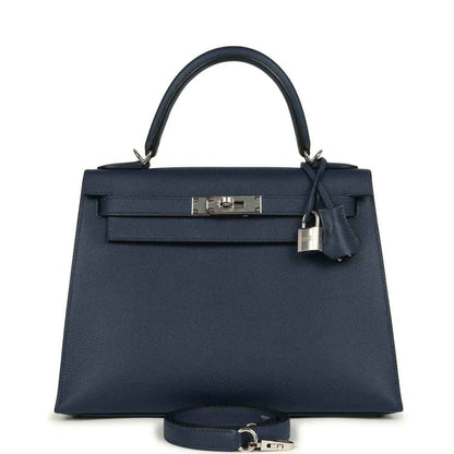 Hermes Kelly Sellier 28 handbag in dark blue pebbled leather with top handle and lock