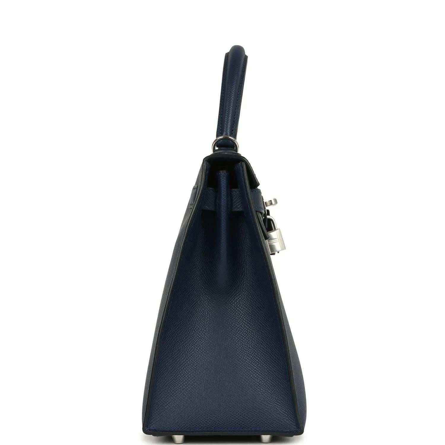 Hermes Kelly Sellier 28 handbag side view in dark blue pebbled leather with strap and lock