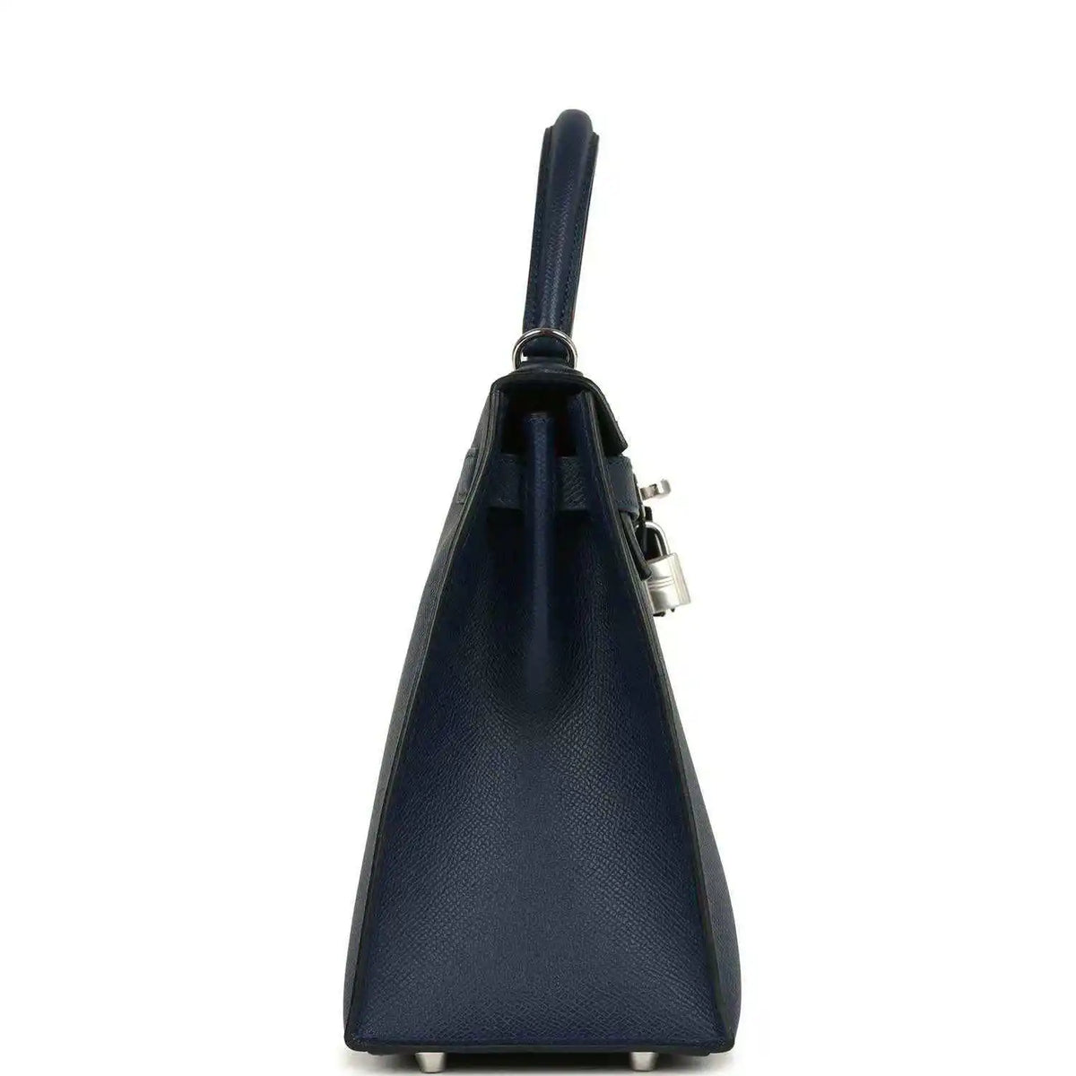 Hermes Kelly Sellier 28 handbag side view in dark blue pebbled leather with strap and lock