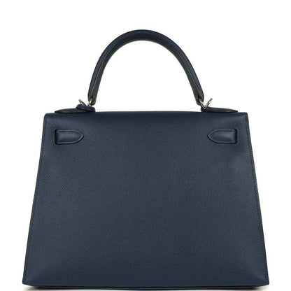 Hermes Kelly Sellier 28 handbag back view in dark blue pebbled leather with top handles