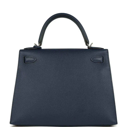 Hermes Kelly Sellier 28 handbag back view in dark blue pebbled leather with top handles