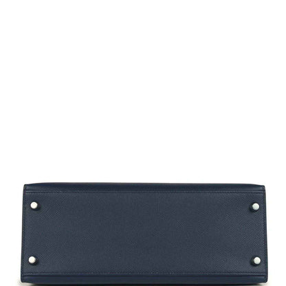 Hermes Kelly Sellier 28 handbag bottom view in dark blue pebbled leather with corner studs