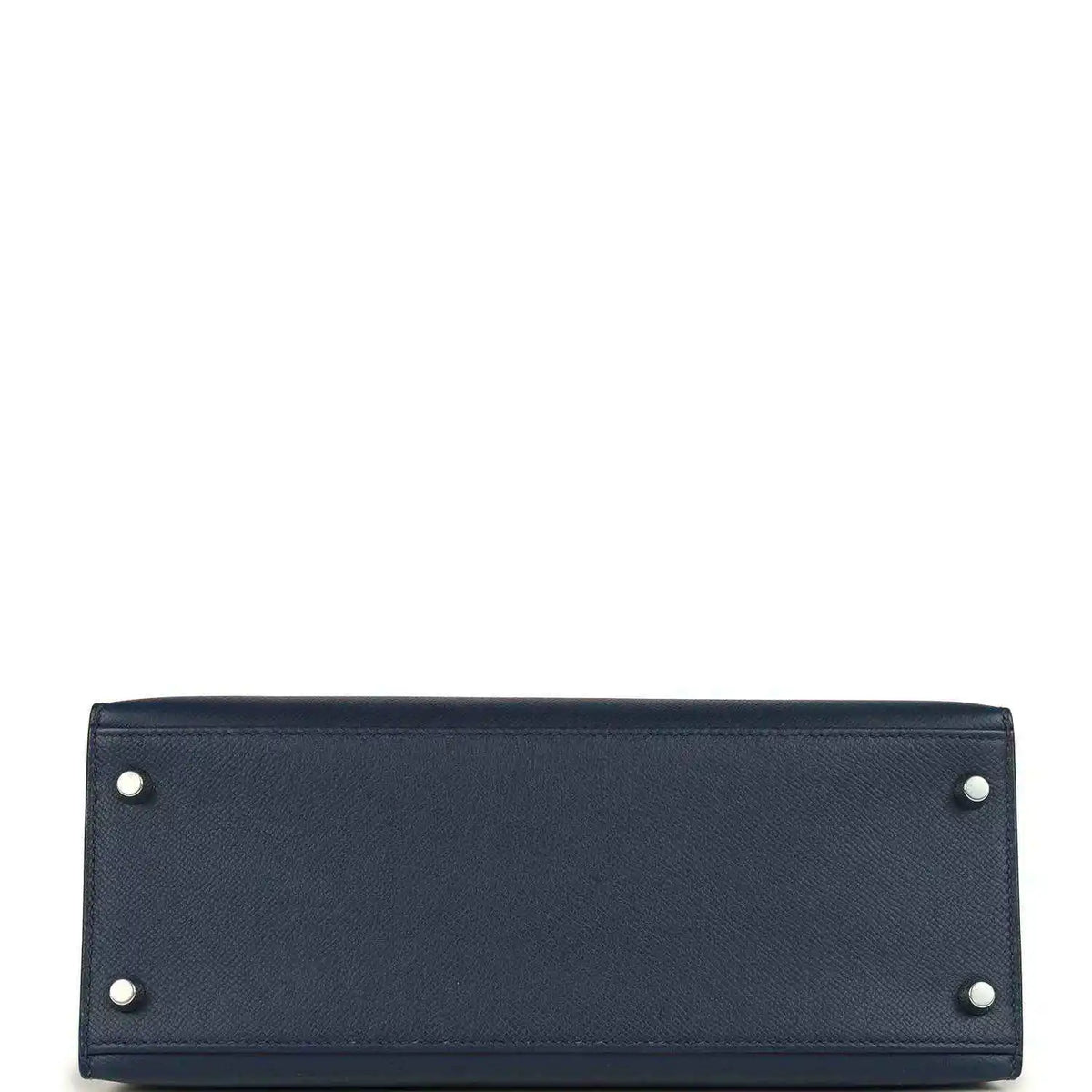 Hermes Kelly Sellier 28 handbag bottom view in dark blue pebbled leather with corner studs