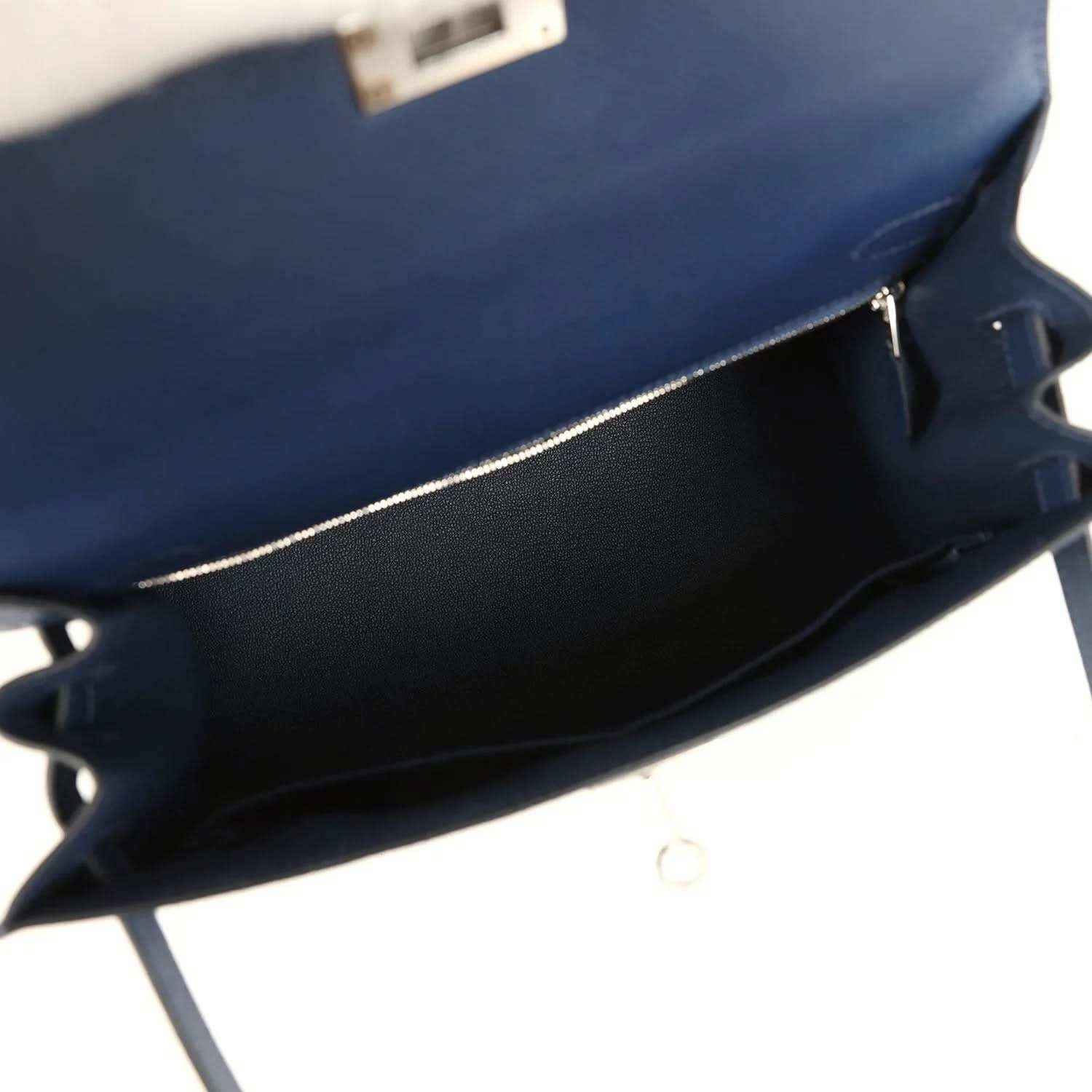 Hermes Kelly Sellier 28 handbag interior view in dark blue leather with top edge and strap