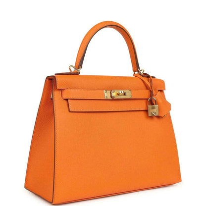 Orange Epsom leather Kelly handbag with front flap, top handle, and gold-tone hardware