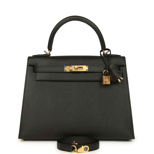 Black structured handbag with gold-tone turn-lock and top handles