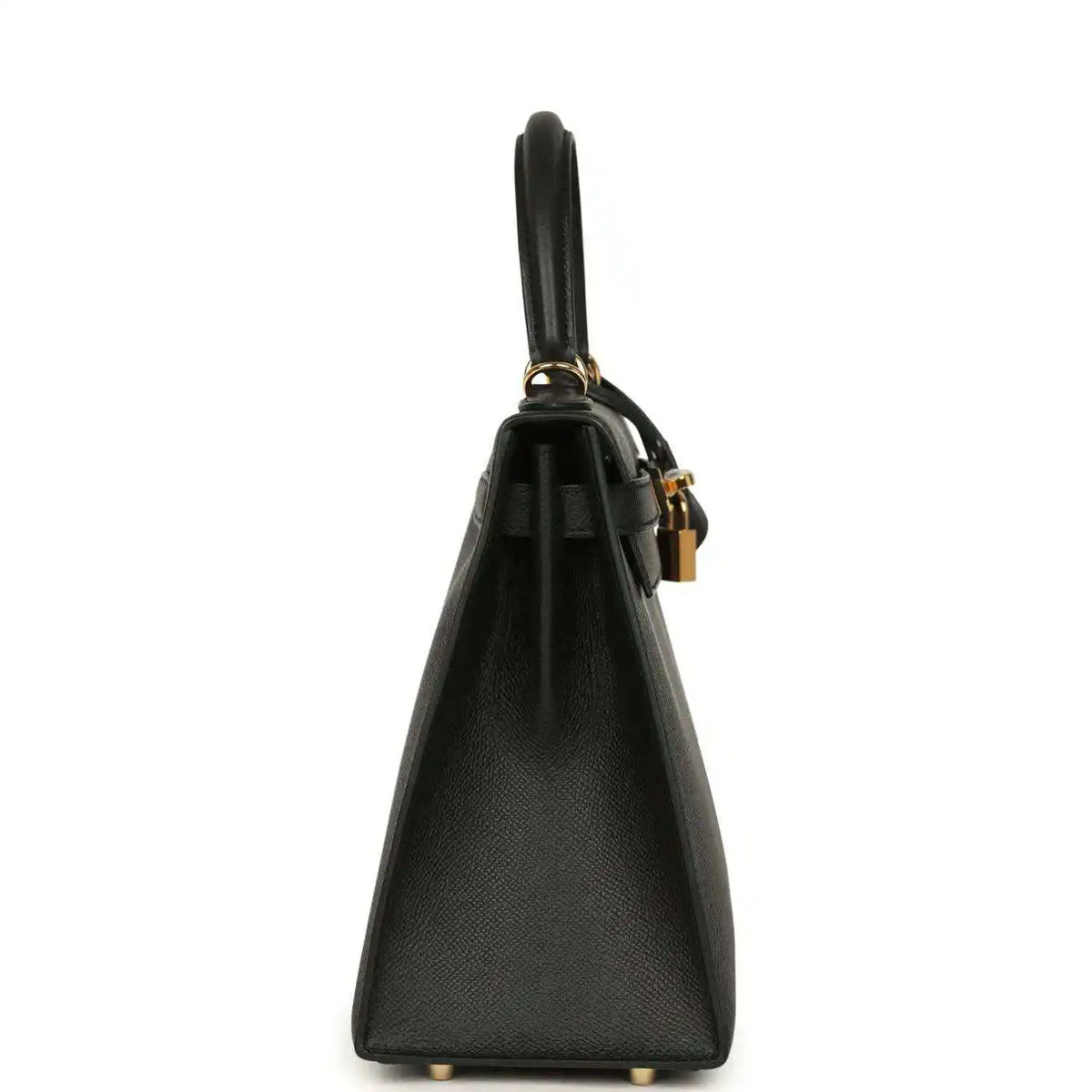 Black leather handbag side view with gold-tone hardware and top handle