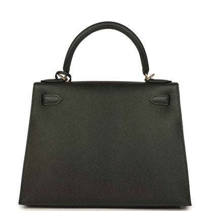 Black structured handbag front panel with two small clasp details