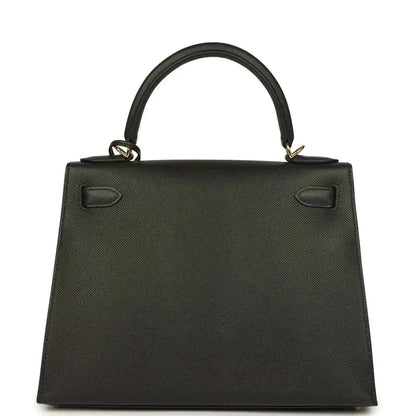 Black structured handbag front panel with two small clasp details