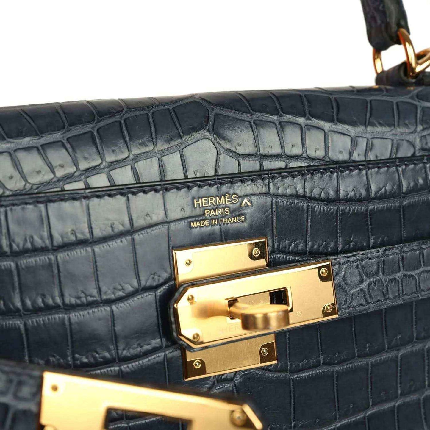 Hermès Kelly Retourne 28 interior lining with Hermès Paris stamp and gold lock plates