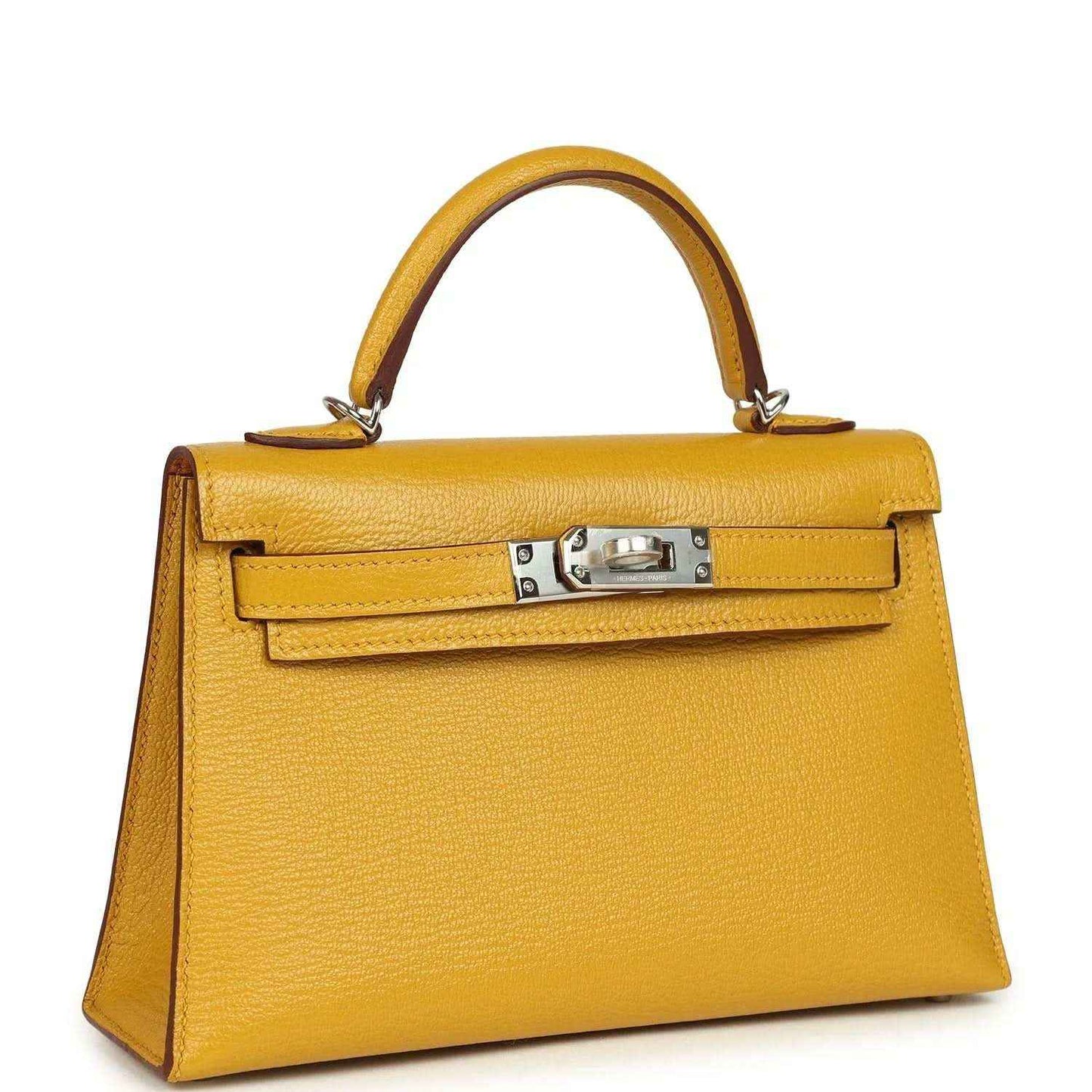 Yellow leather Kelly-style handbag with front lock clasp and top handles, silver-tone hardware