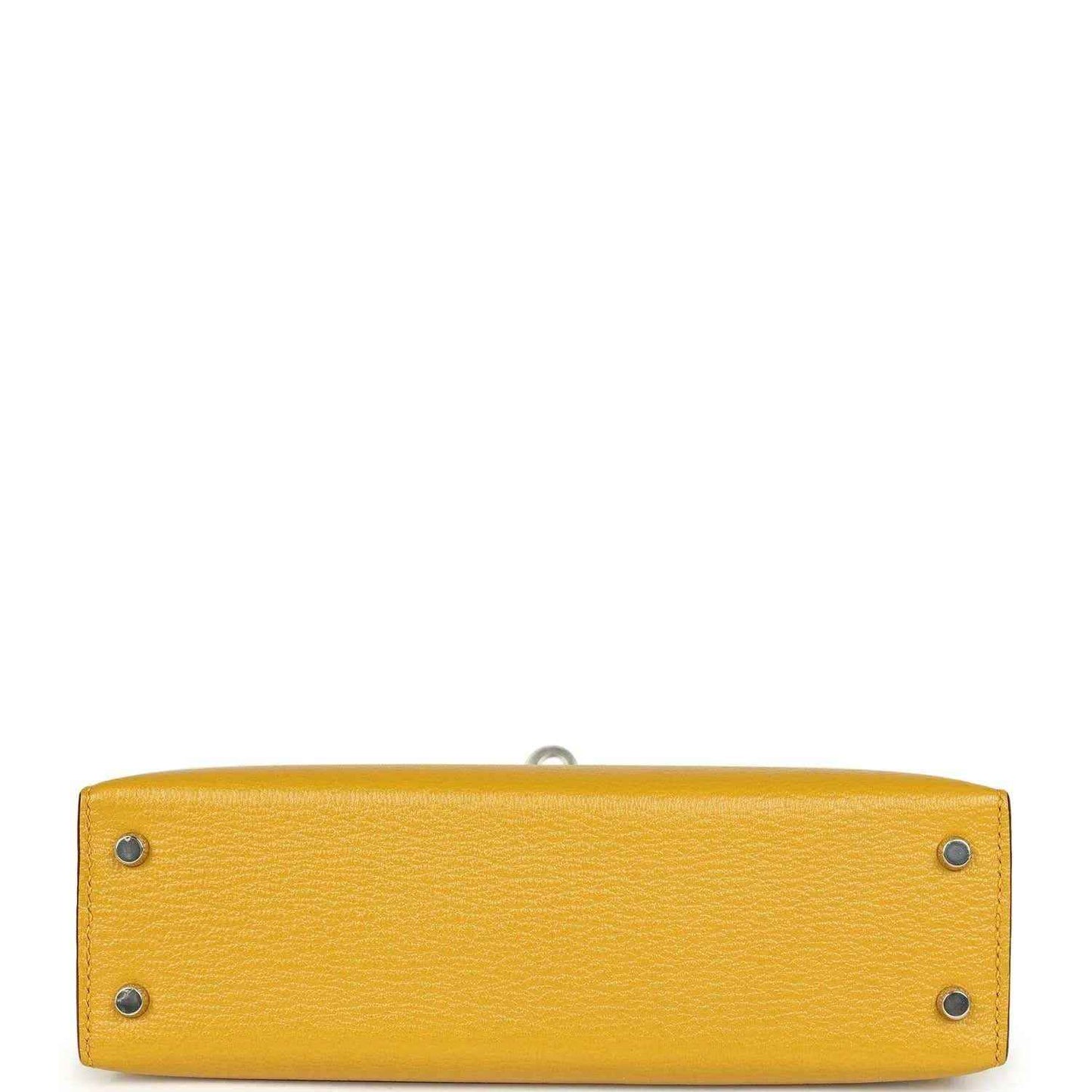 Yellow leather handbag base with two metal studs and inner seam, silver-tone hardware