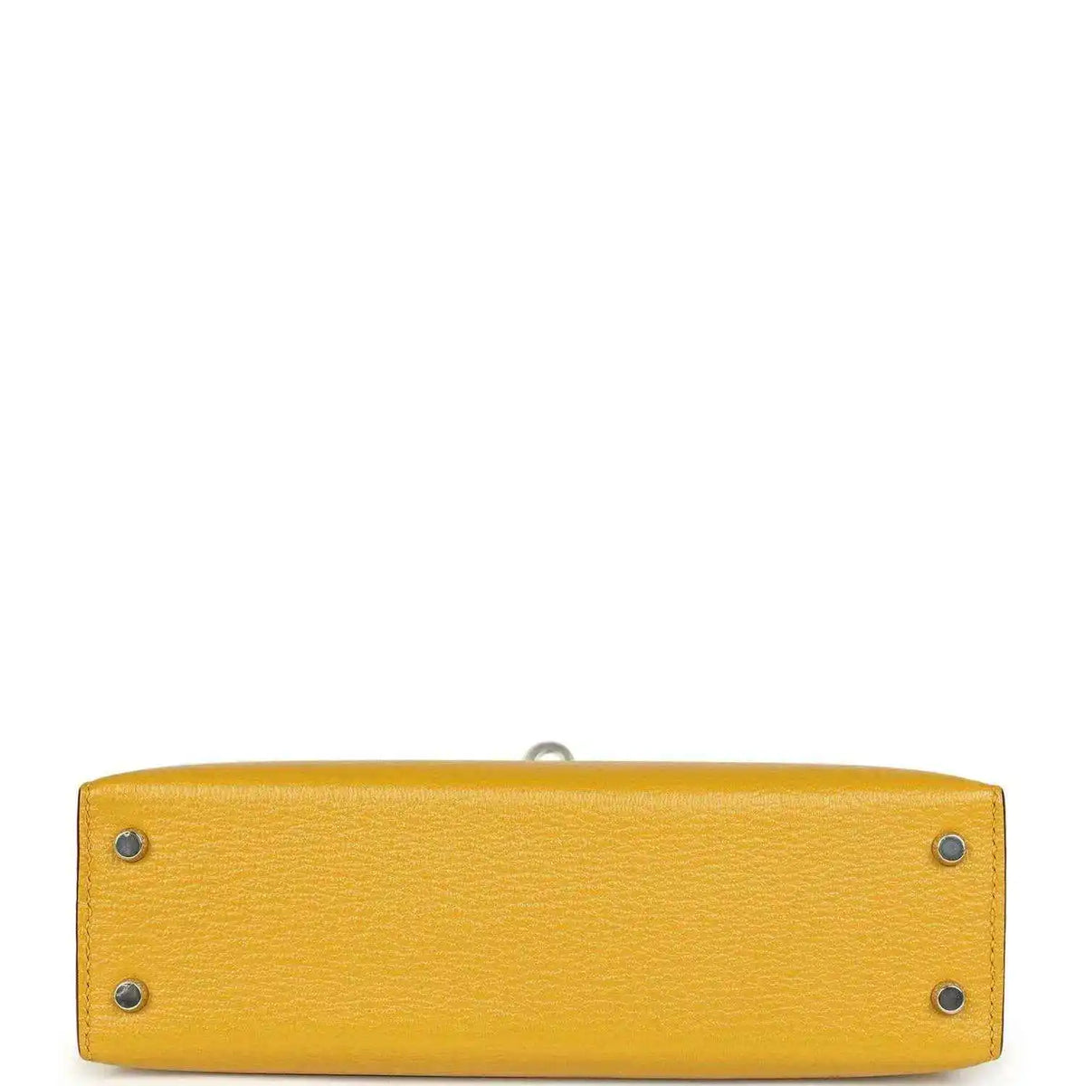 Yellow leather handbag base with two metal studs and inner seam, silver-tone hardware