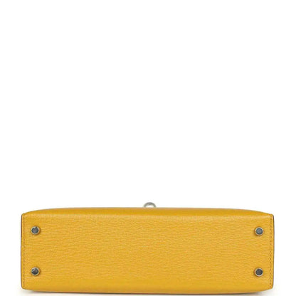 Yellow leather handbag base with two metal studs and inner seam, silver-tone hardware