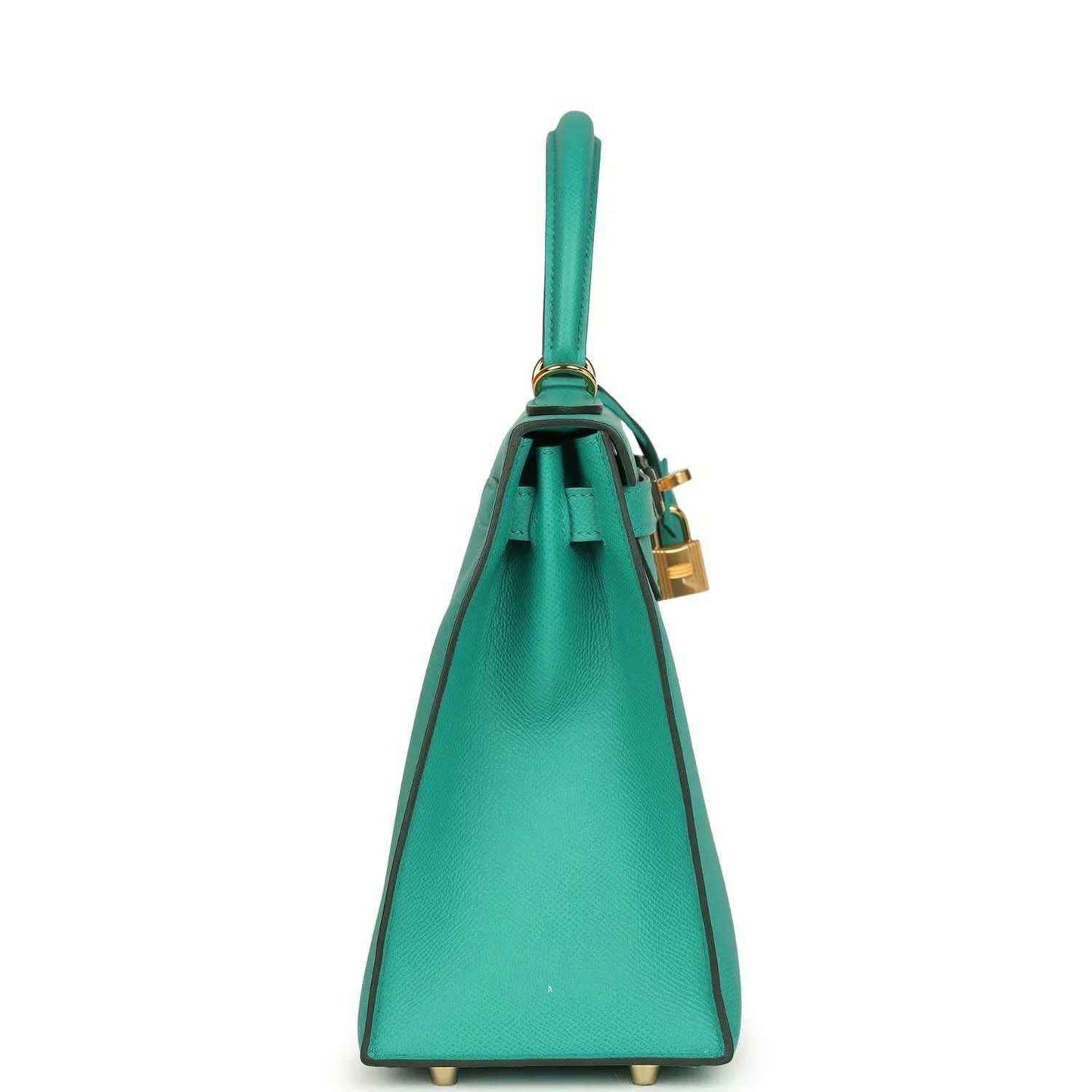 Green leather Kelly-style handbag with top handle, front facing, and gold feet on base.