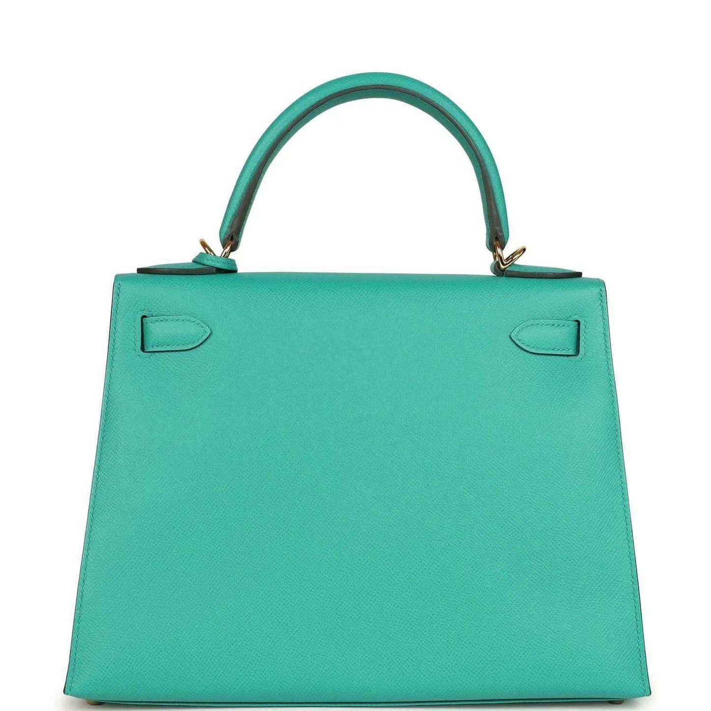 Green leather Kelly-style handbag with top handle and embossed corner details on back panel.