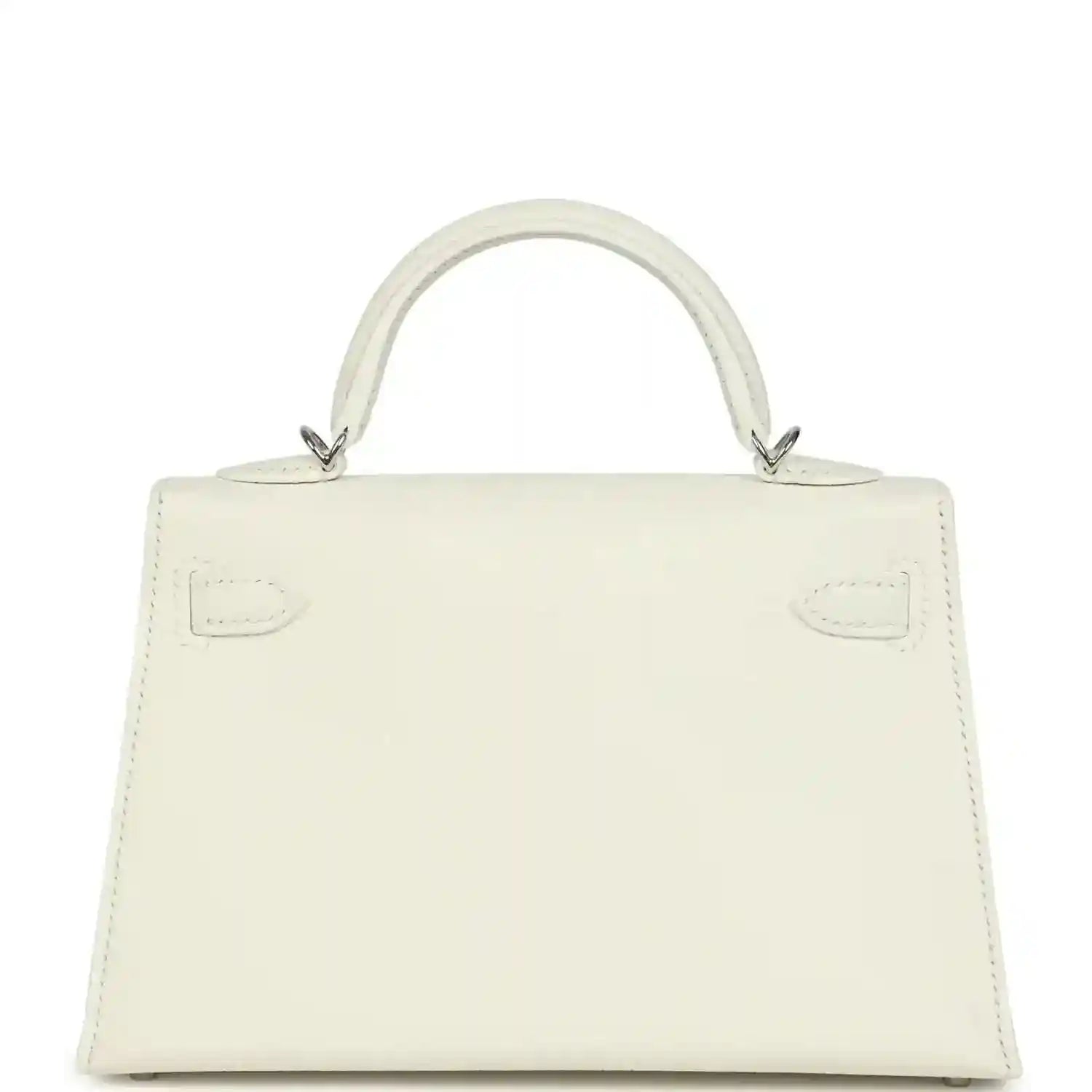 White mini Kelly-style handbag back view with top handles and stitched panel details