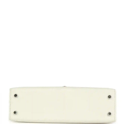 White mini Kelly-style handbag base with four small metal feet