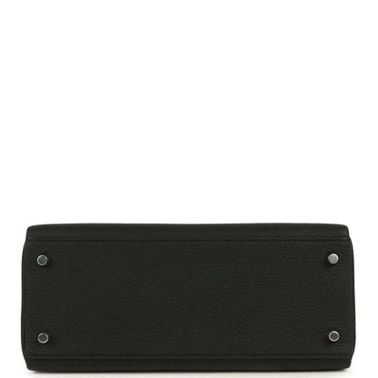 Black Togo leather Kelly bag base with four metal feet