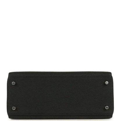 Black Togo leather Kelly bag base with four metal feet