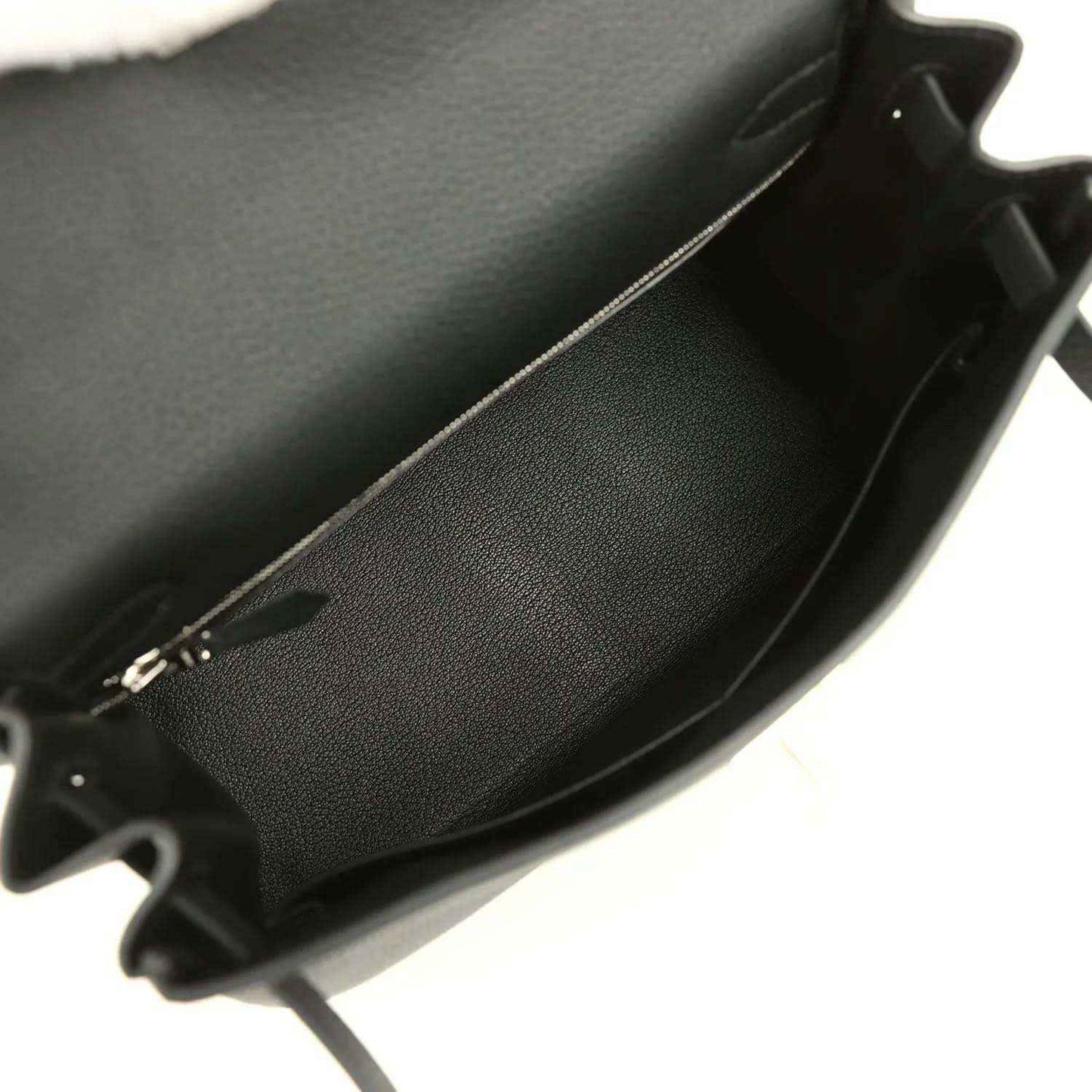 Black leather Kelly bag interior with smooth lining and open edge