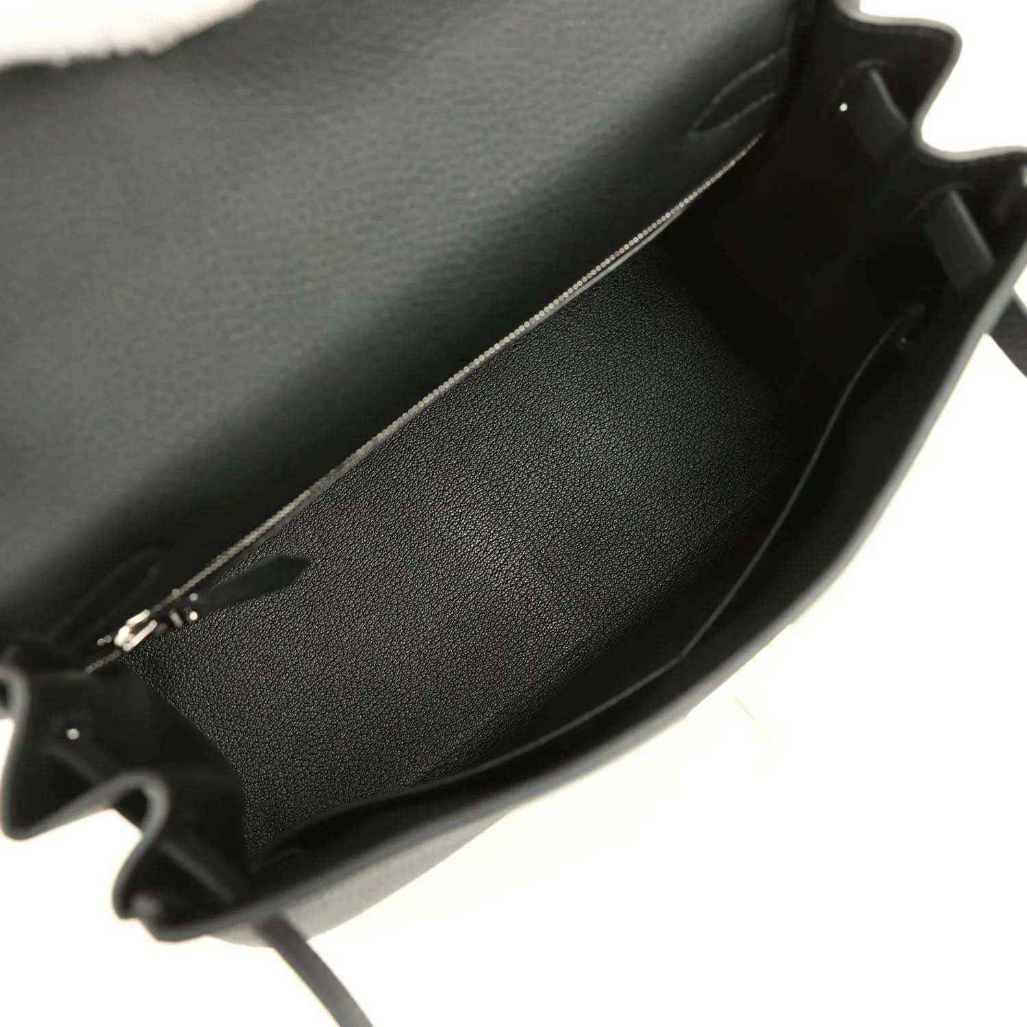 Black leather Kelly bag interior with smooth lining and open edge