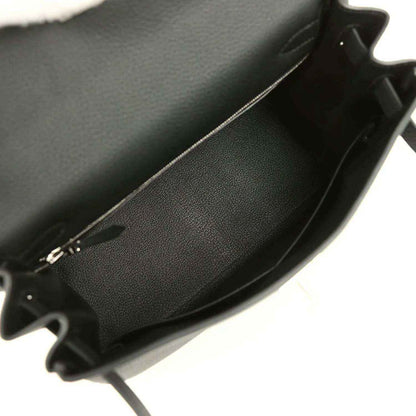 Black leather Kelly bag interior with smooth lining and open edge