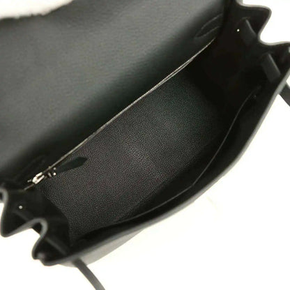 Black leather Kelly bag interior with smooth lining and open edge
