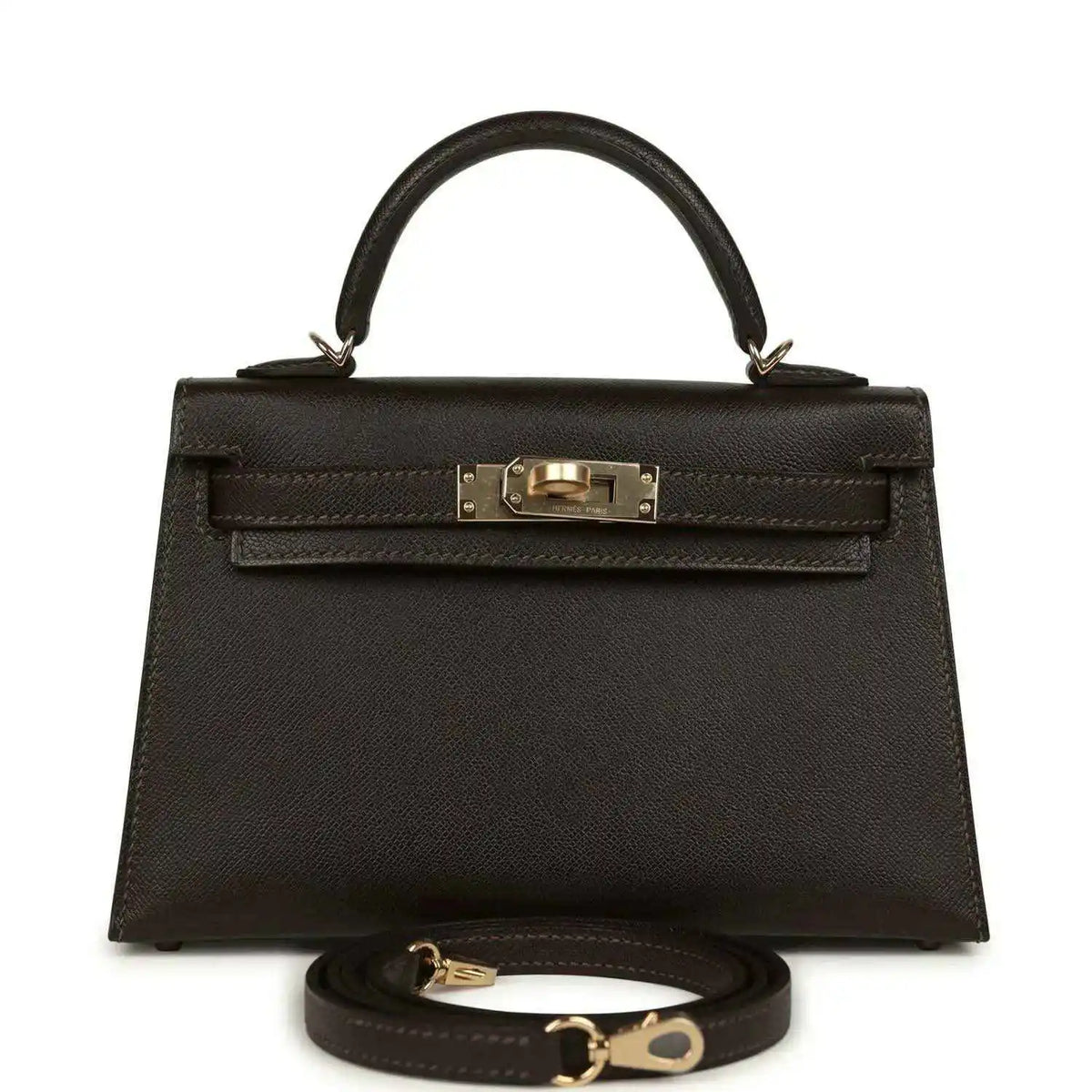 Dark leather mini top-handle bag with gold-tone turn-lock front and strap